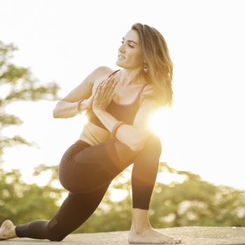 Practicing yoga outdoors in Barcelona